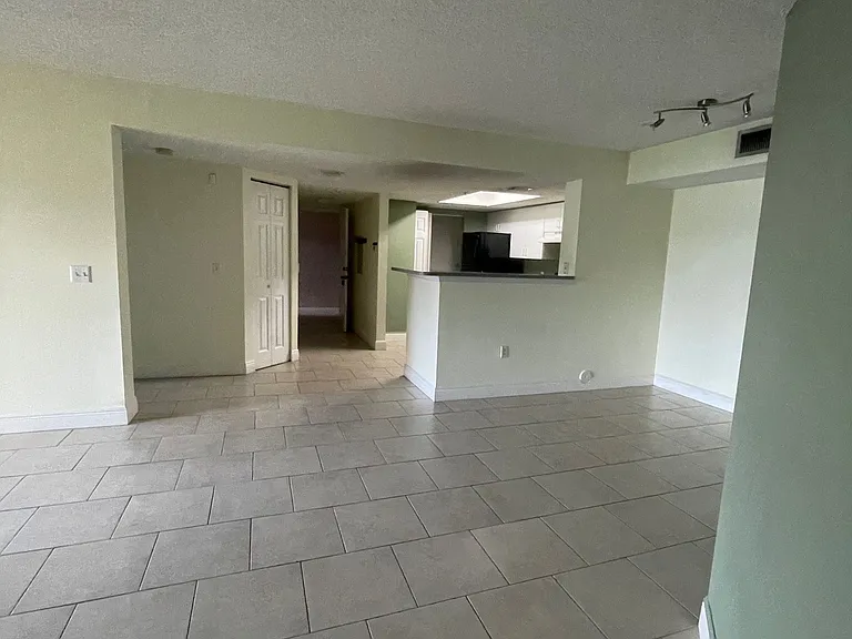 5005 Wiles Rd #102 — Photo 15