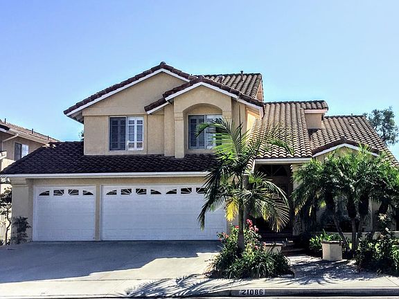 Front - Car Garage + Drive