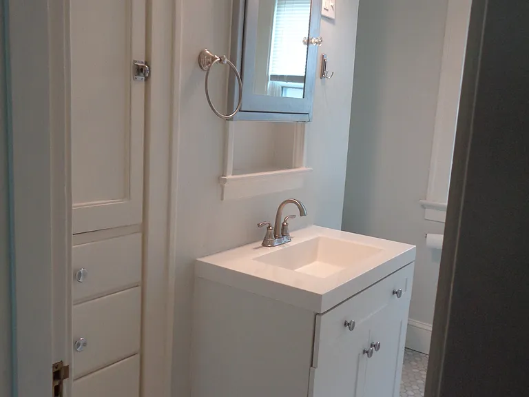 new bathroom vanity and tile floor