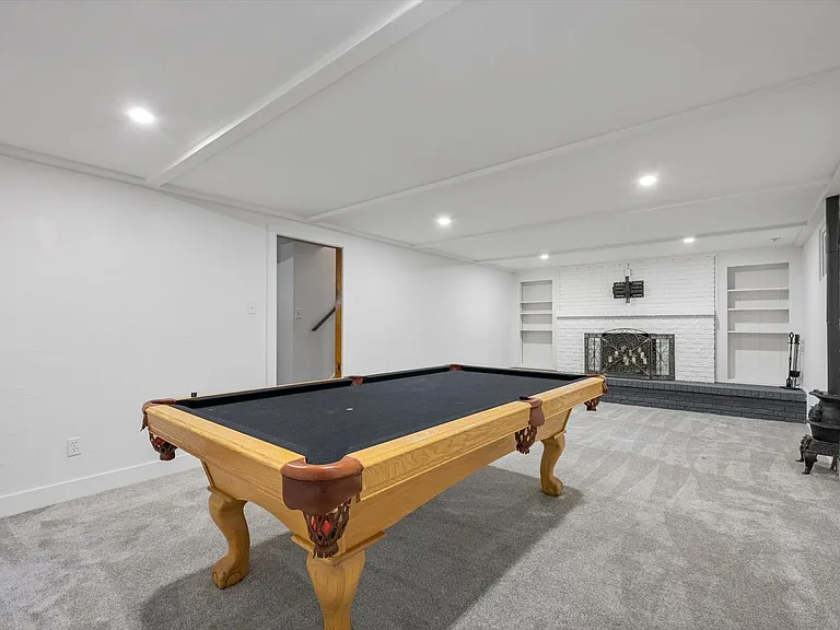 pool table included in basement rec room