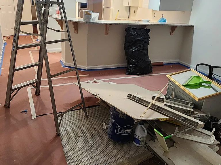 Brand new kitchen cabinets and countertop, prepping for paint 6/24