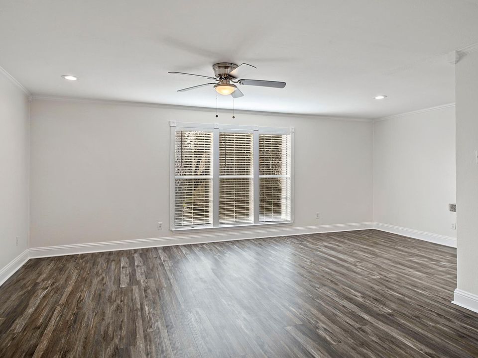 Open floor plan. View of courtyard from living area.