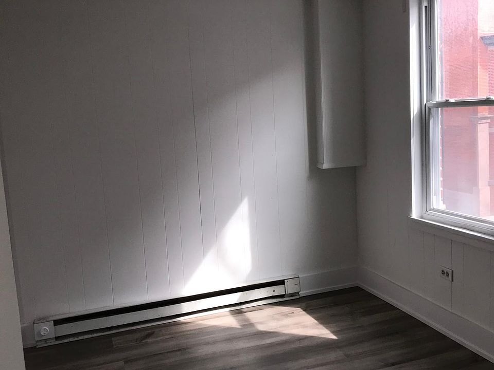 Bedroom 2 of 2 with closet and AC unit (not shown in photo) faces 16th Street