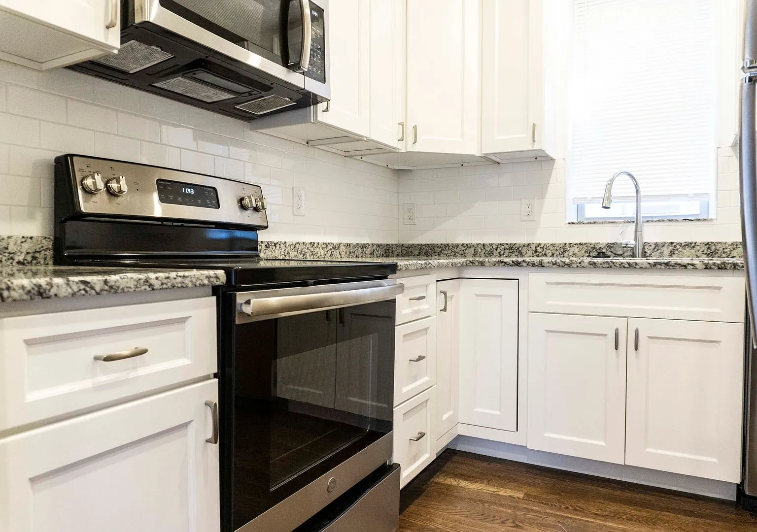 Modern 2-Bed Condo with Parking Steps from the Green Line & Boston Colleges! — Photo 4