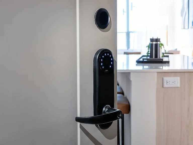Apartments and townhomes with smart technology features including keyless home entry