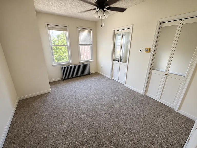 Master bedroom with plenty of closets and windows