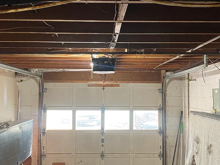 Single car garage in basement.