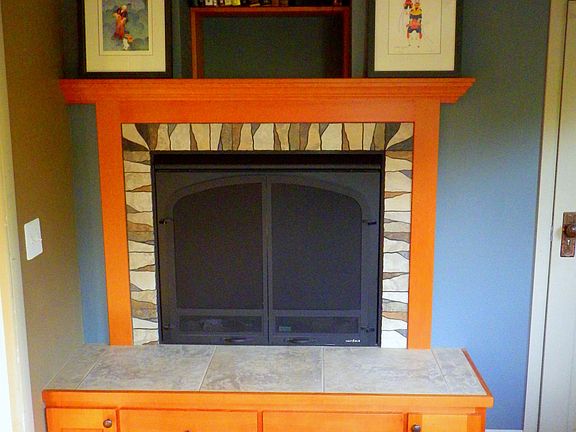 Fireplace, downstairs bed.