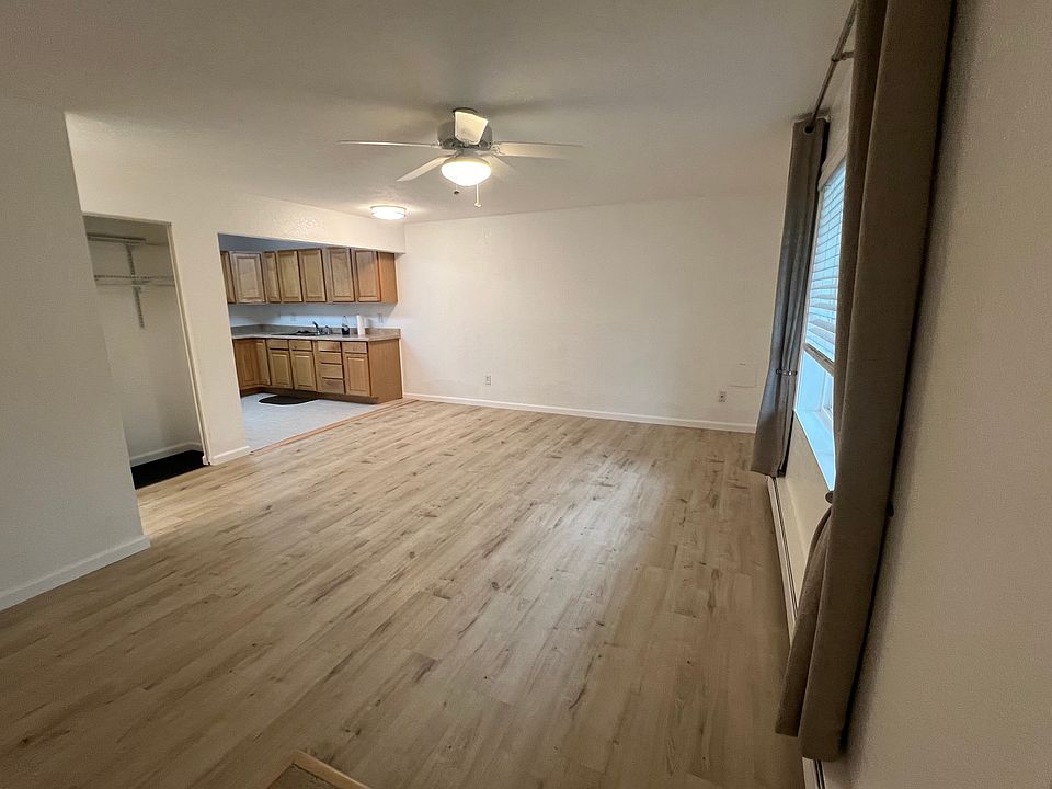 Living room with new flooring throughout.
