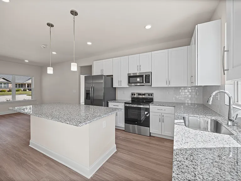 Microwave, fridge, stove and oven, and dishwasher included