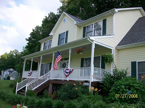 2 beautifully landscaped acres