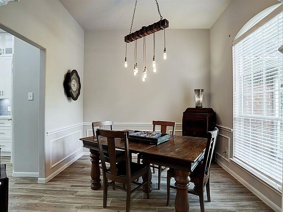 Dining room is located off the entry with easy access to the kitchen.