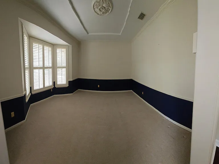 Extra room 2, upgraded wood shutters and full bay windows.
