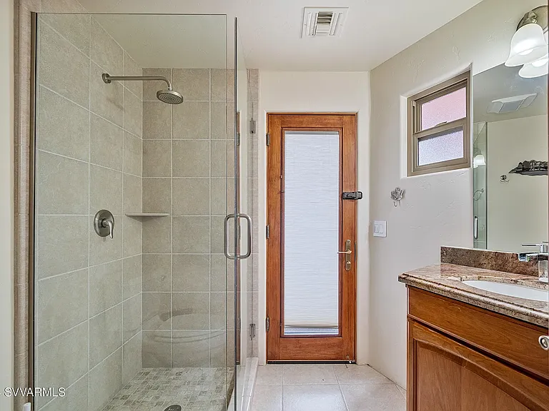 Bathroom Off Lower Level Bedroom with Pool Access