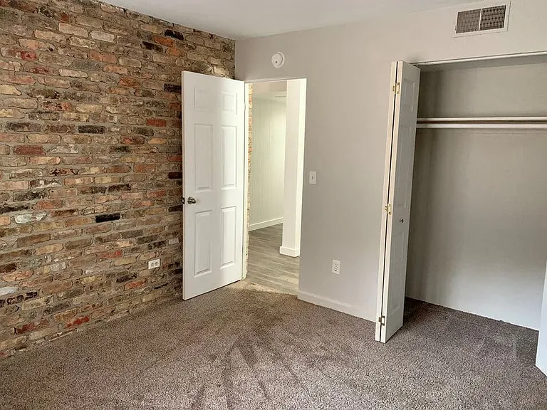 Bedroom with Brick Fancy Wall