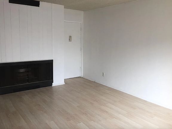 Spacious Living Room + Fireplace