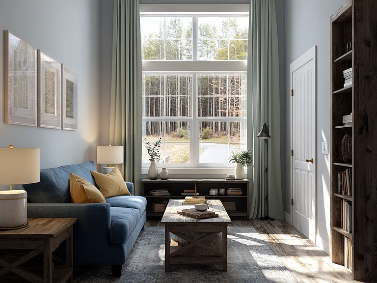 right and inviting living room with warm LVP flooring, a large picture window with natural light, and an open 15x12 layout perfect for relaxing or entertaining.