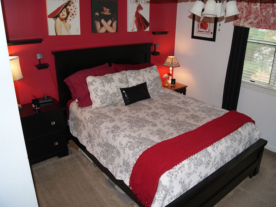 Pictured is a Queen Size bed with 2 Side Tables - A King Siz