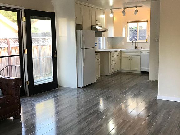 View as you walk in front door into living room (new kitchen