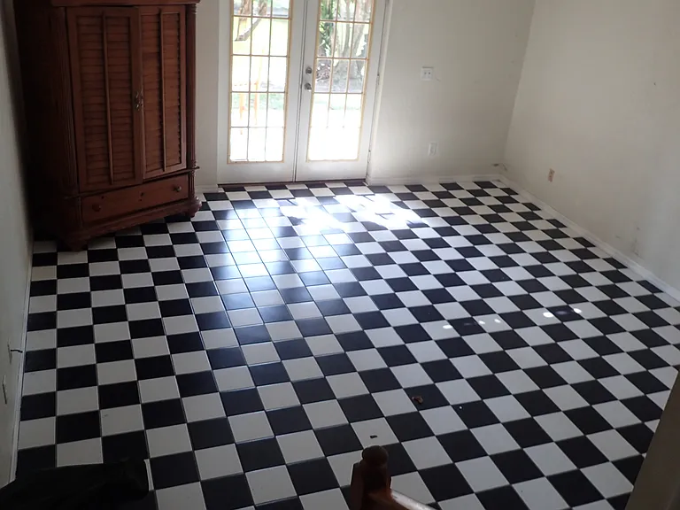This is downstairs bedroom/bonus room with full bath and little patio