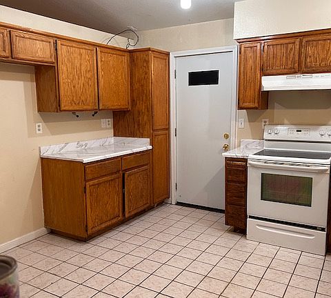 Kitchen and door to Garage