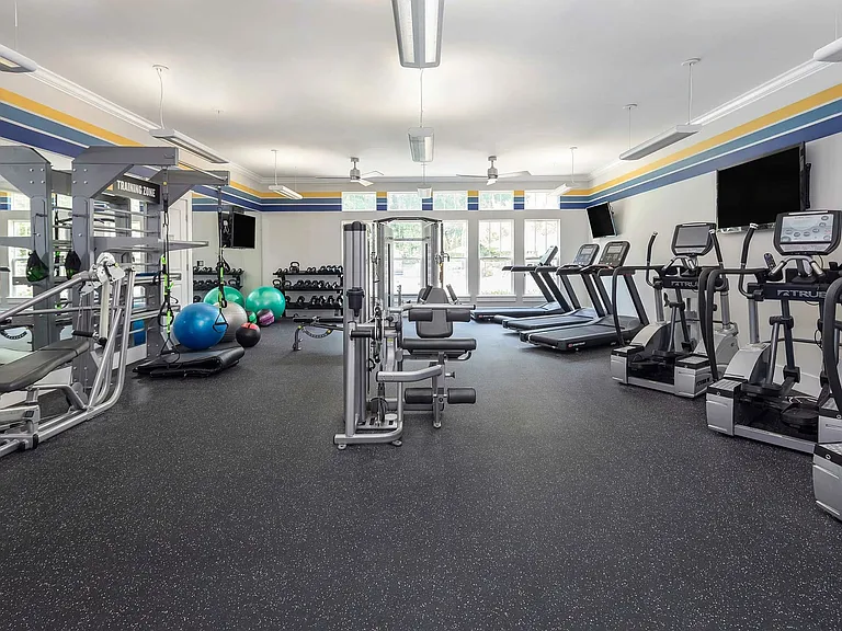 State-of-the-art fitness center with cardio equipment, strength training, and free weights24-hour gym access for active apartment living in Charlotte.