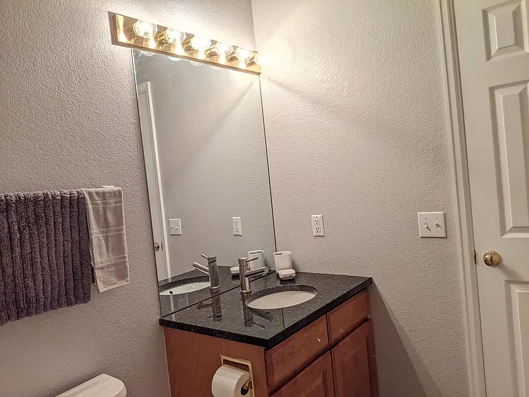 Upstairs is a 3rd Bedroom a second Primary suite with private ensuite bathroom and walk in closet