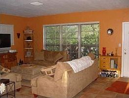 Living Room with warm tones throughout.