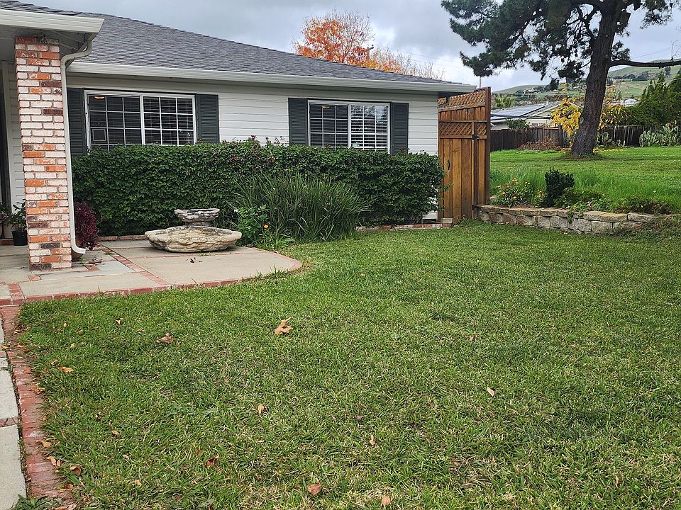 Front yard, house neighboring the park.