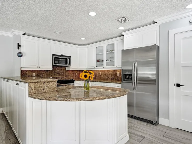 4142 NW 58th Dr — Photo 20