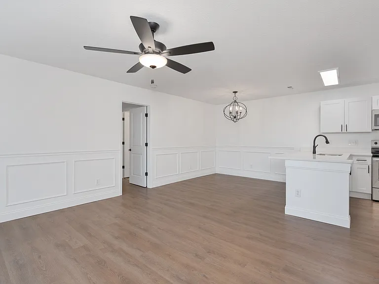 Experience modern living in this bright, open-concept space with sleek kitchen finishes. Experience modern living in this bright, open-concept space with sleek kitchen finishes.