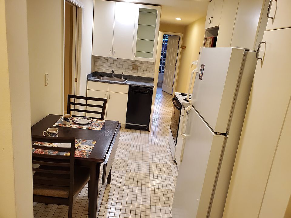 Kitchen when you come in from living room. Space for table. Right side refrigerator, then counter space, then stove/oven. Plenty storage. Straight ahead is sink, disposal, and dishwasher.