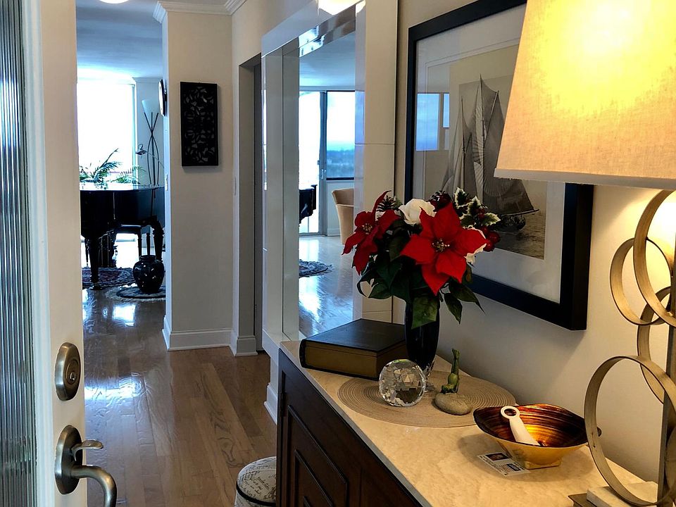 Welcoming entry with gleaming hardwood floors