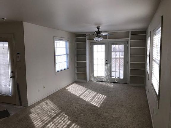 Four season room leads to an outdoor deck