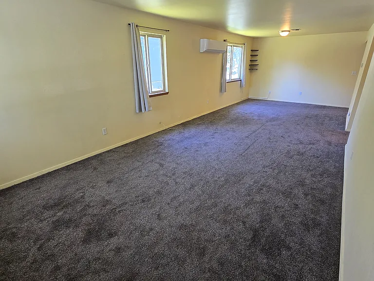 Entrance of home opens into living room
