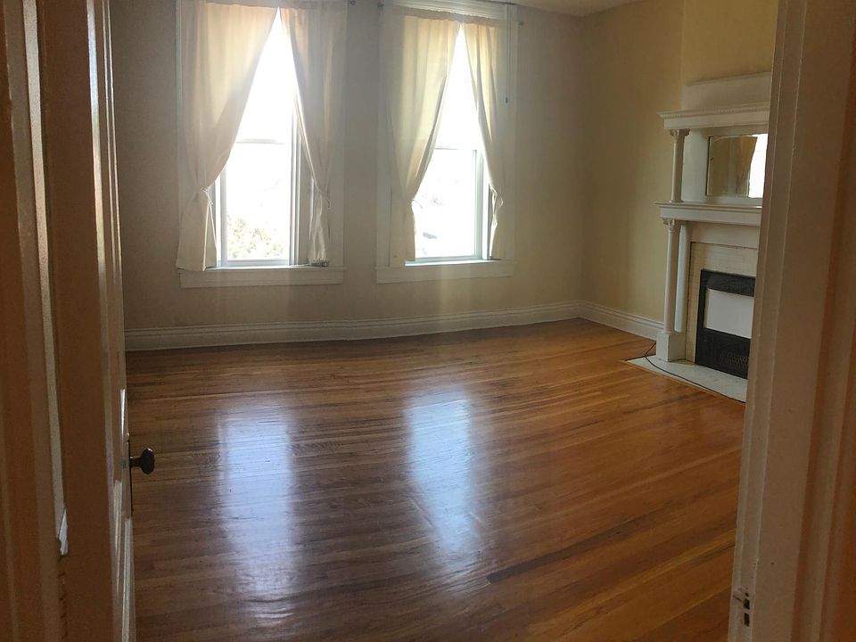Living room, view from office. Windows face Baxter Avenue.