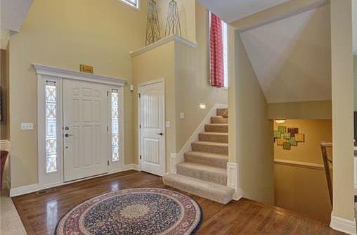 SPACIOUS ENTRY WITH HARDWOOD FLOORS