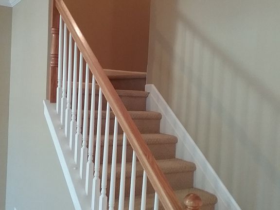 Stairs with landing for easy access to upstairs area