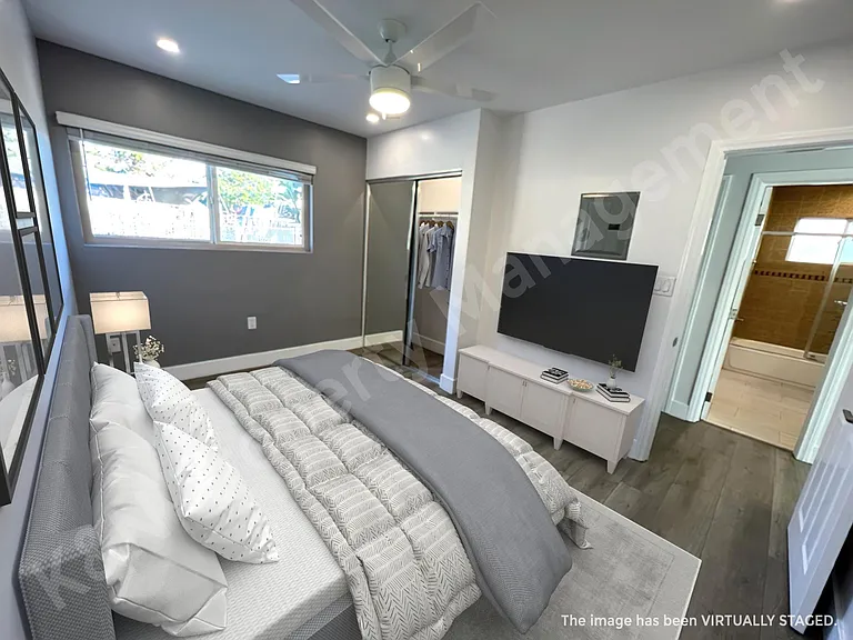 Bedroom #3 with large mirrored closet