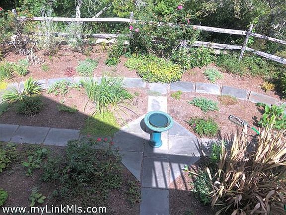 The Deck Overlooks this Lovely Patio