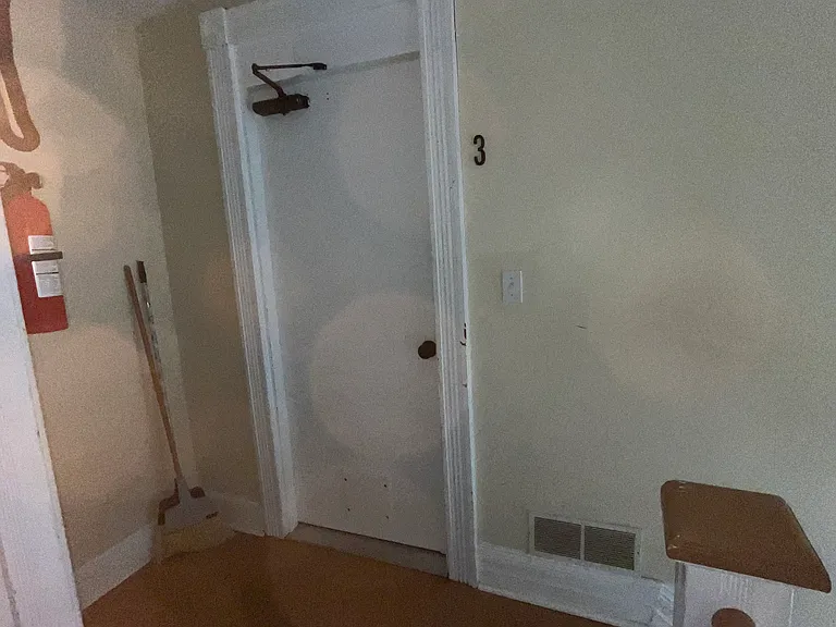 Private main entry hallway to apartment front door.