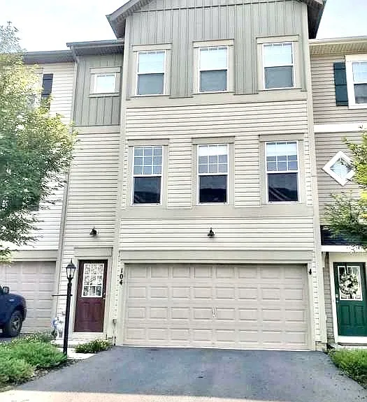 Two car garage and ample parking