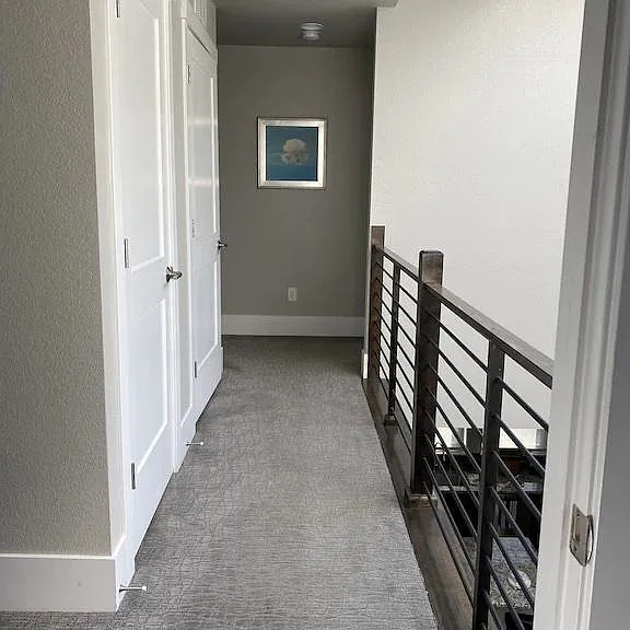 Walkway to laundry and 2nd bedroom