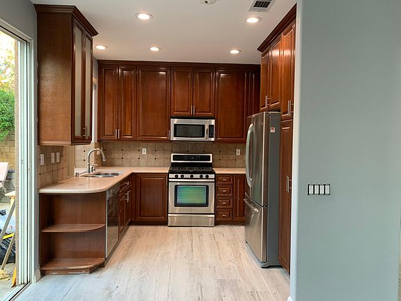 Kitchen with stainless steel appliances.