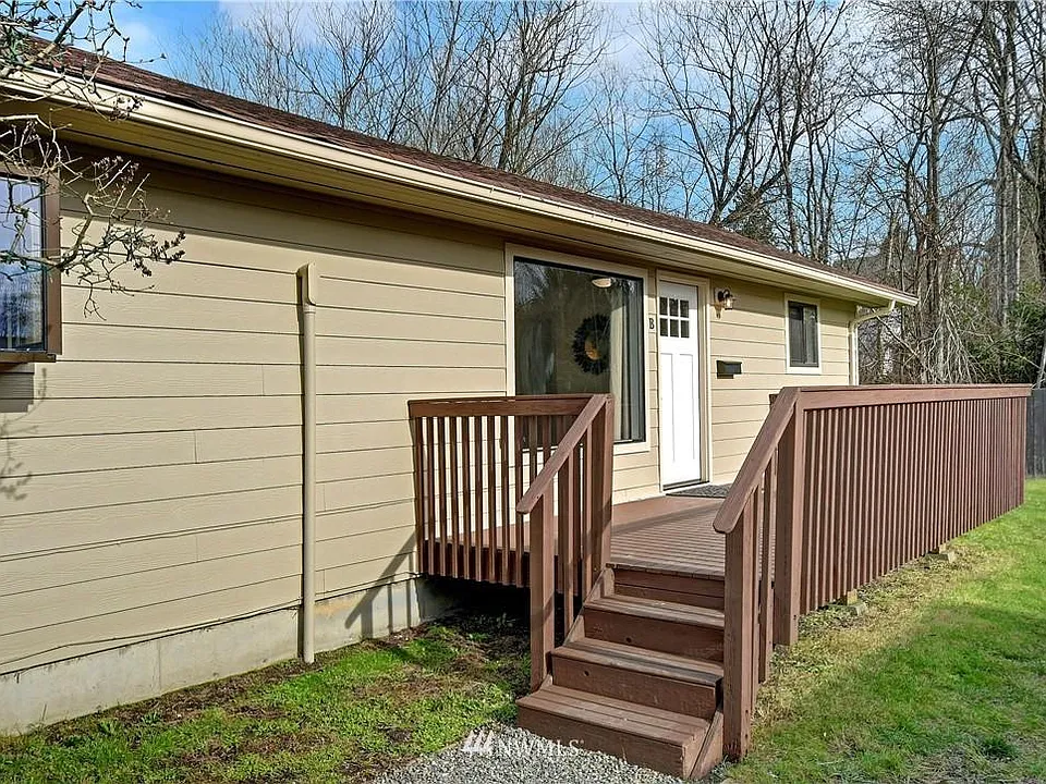 Front Door with enclosed deck.