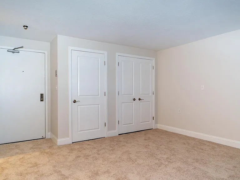 Available carpeted living spaces with extra storage