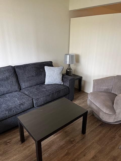 new sofa, we have 1 Apt. with all plank flooring new bed, also