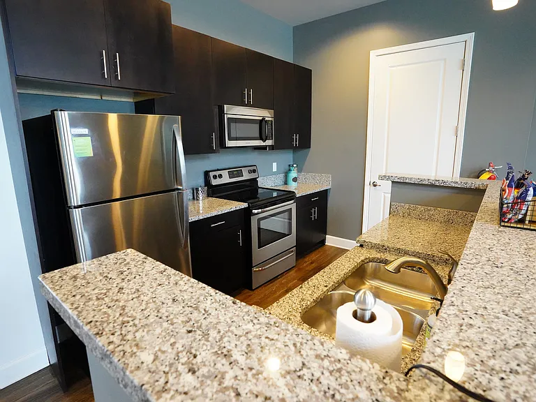Grab a seat at the breakfast bar and make yourself at home_whether it's coffee, catch-ups, or quick meals.