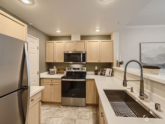 Brilliant all new stainless steel fridge, oven, microwave and under-mount sink>