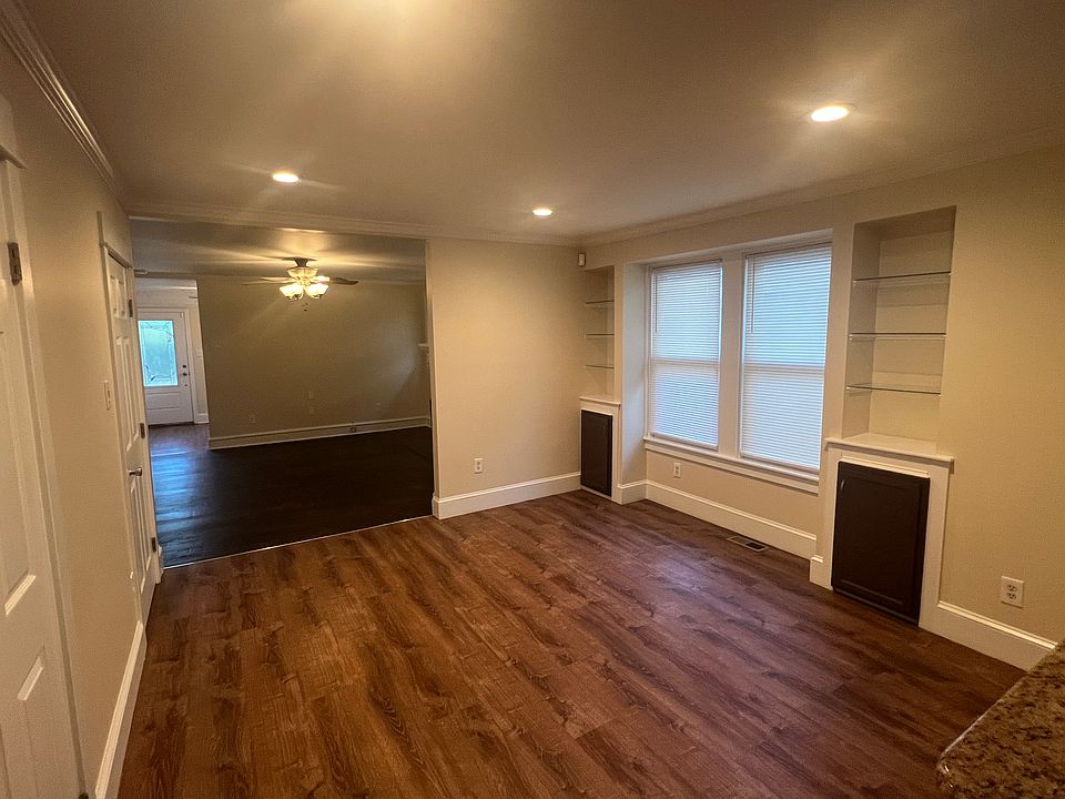 Dining area (built in shelving, vinyl plank floor)
